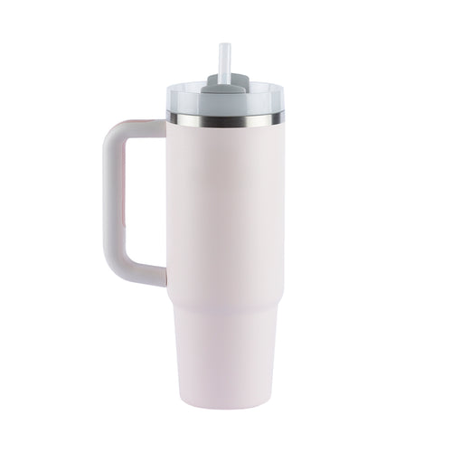 Copo térmico Stanley rosa claro com alça e canudo.